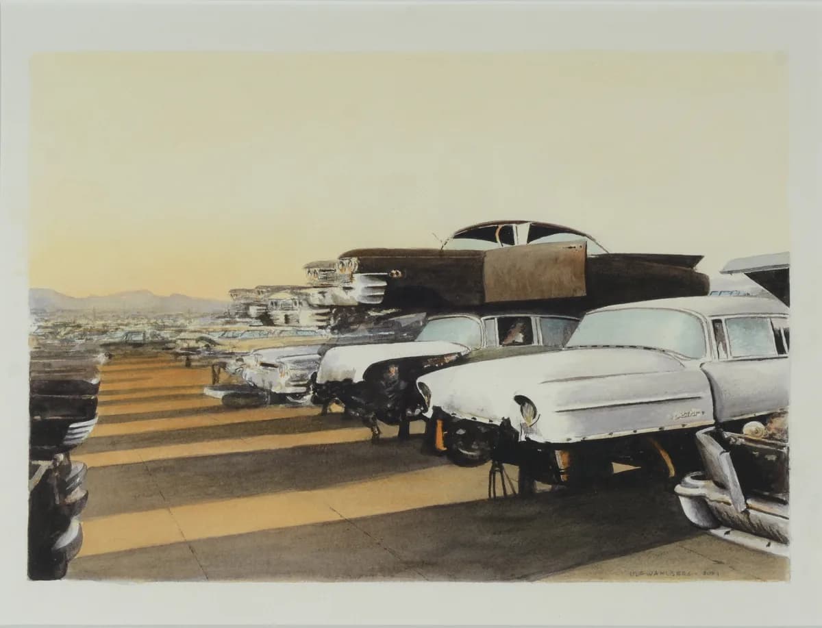 Junkyard filled with classic cars.
